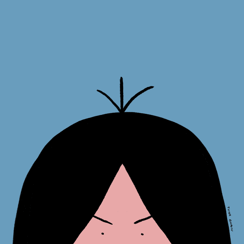 a hand smooths down a tuft of hair on a persons head